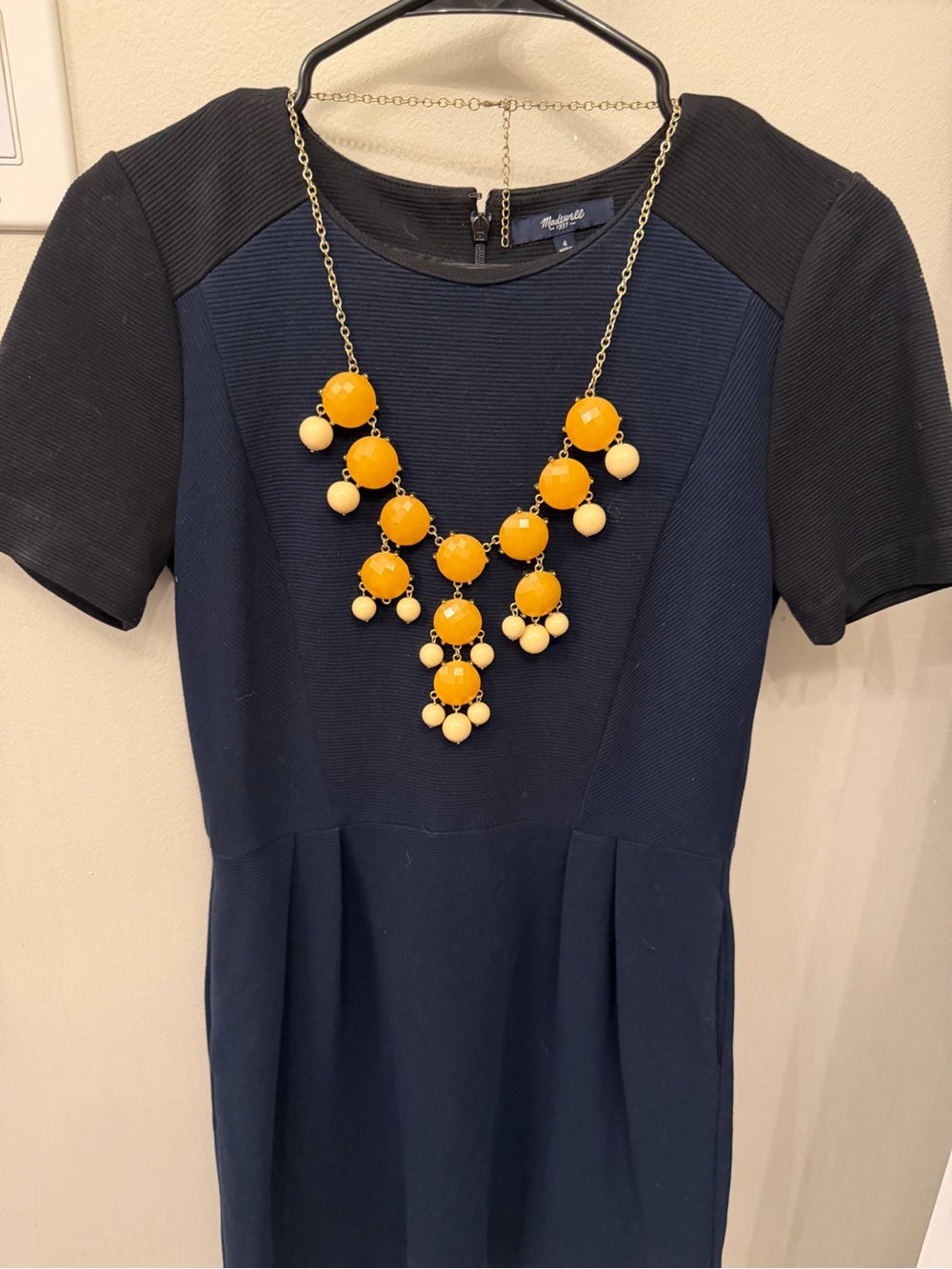 Costume jewelry gold tone bauble necklace